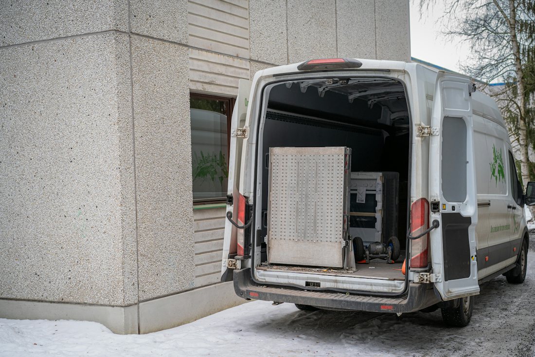 Delivery van with its back doors open